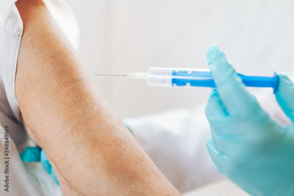Vaccine administration on an elderly patient Vaccine administration on an elderly patient