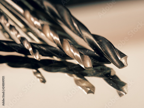 metal drill in assortment on a white background photo