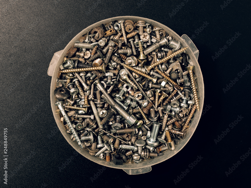 Fototapeta premium screws nuts bolts washers screws loose in assortment
