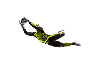 Male soccer player goalkeeper catching ball in jump. Silhouette of fit man with ball isolated on white studio background