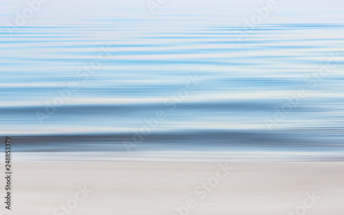 Abstract Seascape Motion Blurred Background Of Summer Beach