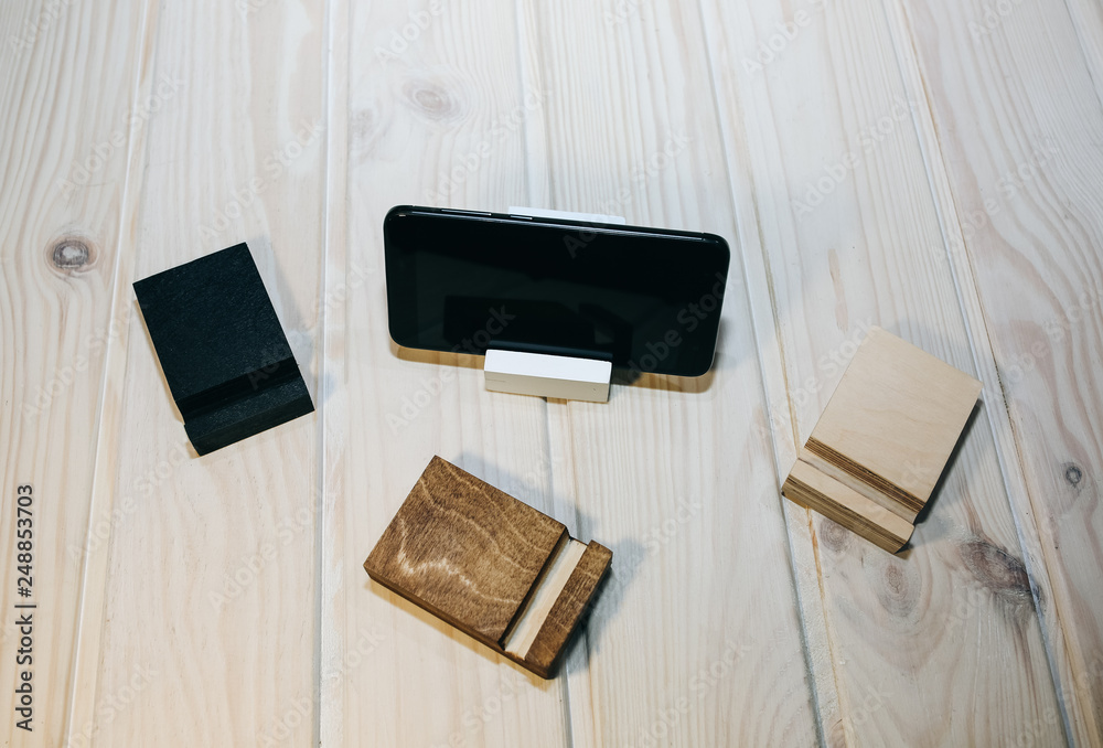 Handmade wooden phone holder. Eco-friendly design. Handmade wooden phone holder. Eco-friendly design.