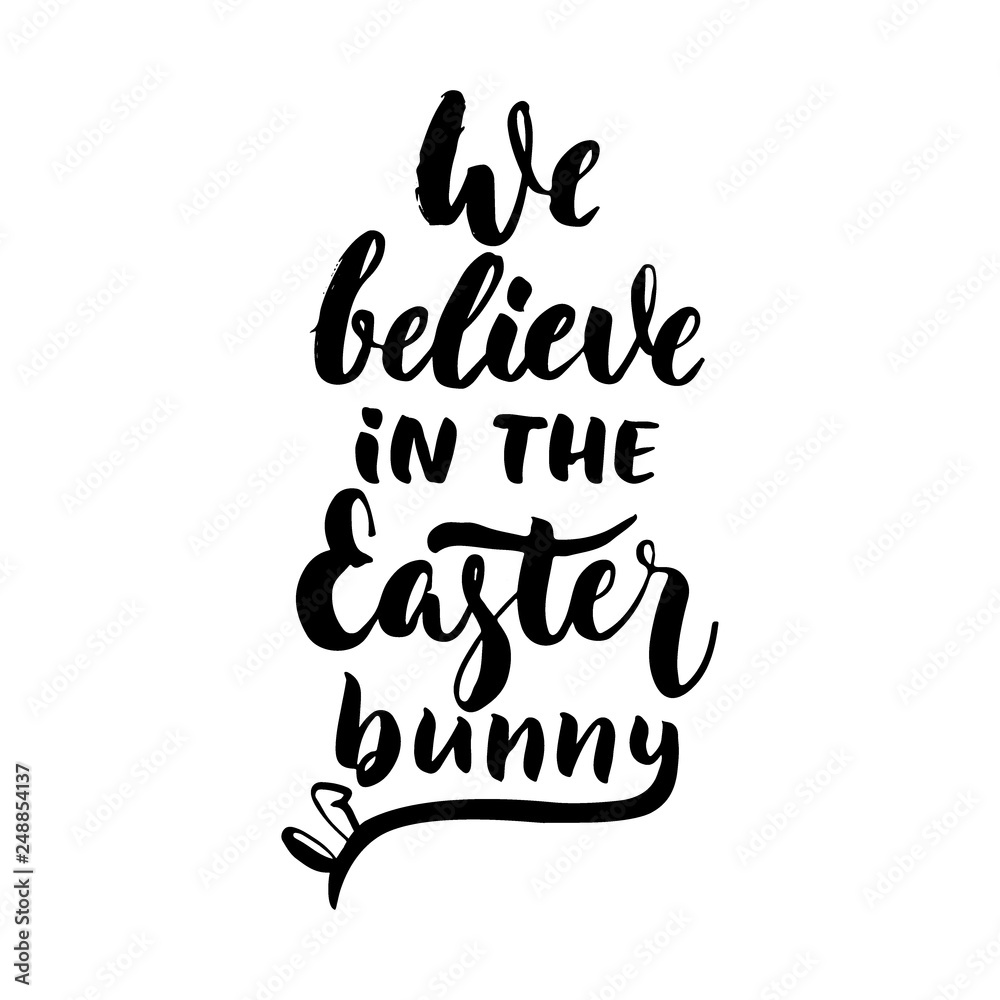 We believe in the Easter bunny - hand drawn lettering calligraphy phrase isolated on white background. Fun brush ink vector illustration for banners, greeting card, poster design, photo overlays.