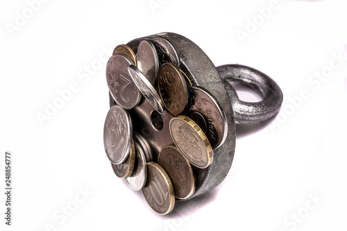 search magnet with found money and coins on isolated white background