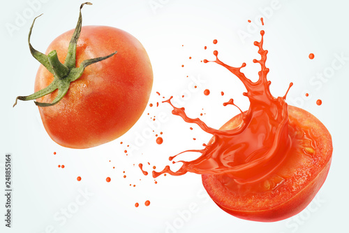 Картината върху платно Red Tomato Sliced with Splashing juice or tomato sauce, Isolated on white background with Clipping path