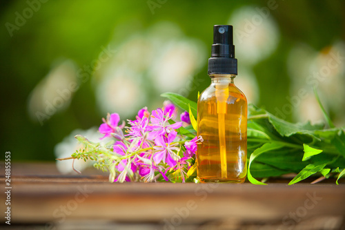  blooming Sally essential oil in beautiful bottle on table