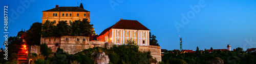 Schilderij op canvas View of illuminated landmarks of Castle hill at night in Veszprem, Hungary