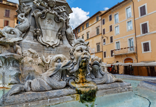 Fountain on Piazza della Rotonda with Parthenon behind on a bright morning in Rome, 