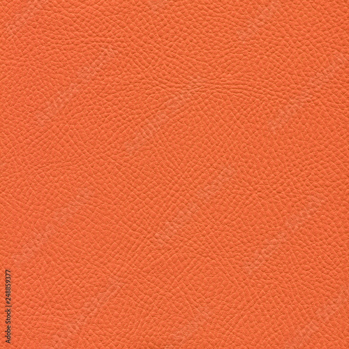 Orange leather textured background. Vintage fashion background for designers and composing collages. Luxury textured genuine leather of high quality.