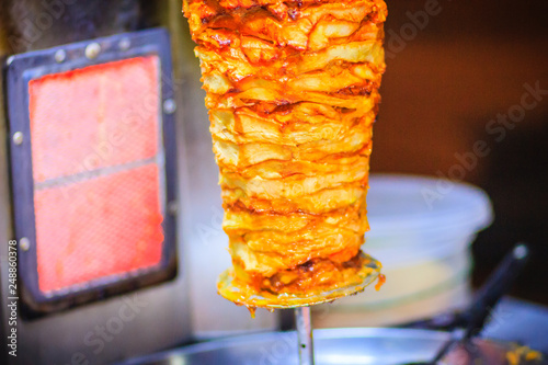 Traditional Turkish food, Doner Kebab in the restaurant. Lamb and Chicken Doner Kebab. Grilled skewered lamb mutton, a traditional meat kebab sandwich. photo