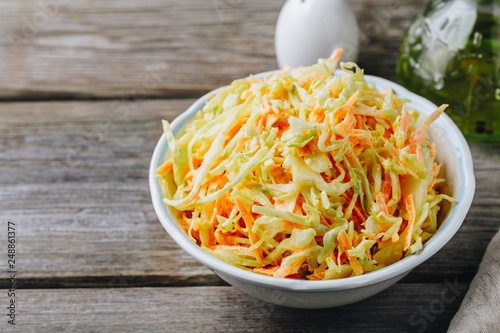 Cuadro en lienzo Coleslaw salad with white cabbage, carrots and mayonnaise dressing