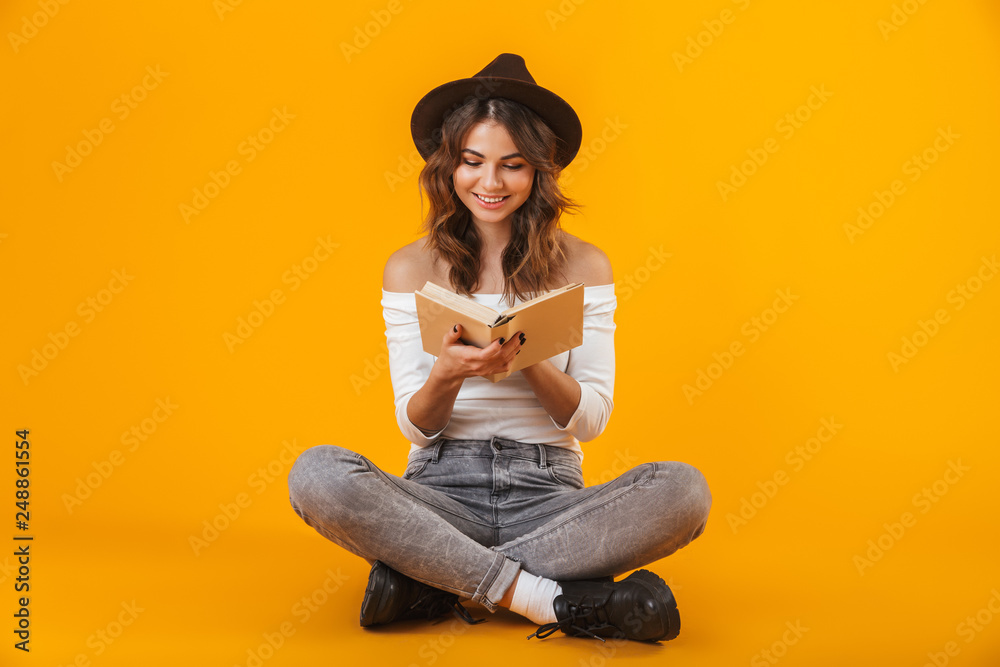 Portrait of a cheerful young woman wearing white shirt Portrait of a cheerful young woman wearing white shirt