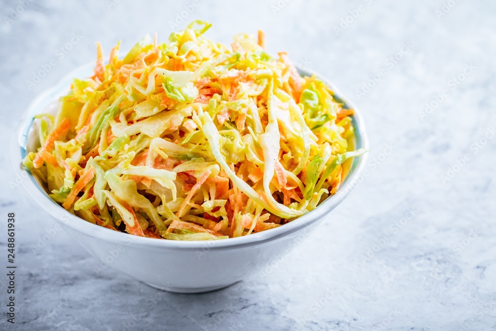 Coleslaw salad with white cabbage, carrots and mayonnaise dressing