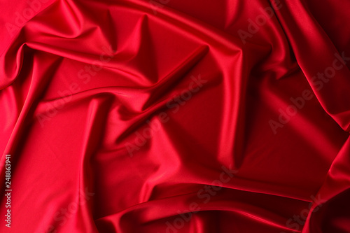 texture, red silk fabric panoramic photo. Silk Duke mood satin - beautiful and regal.