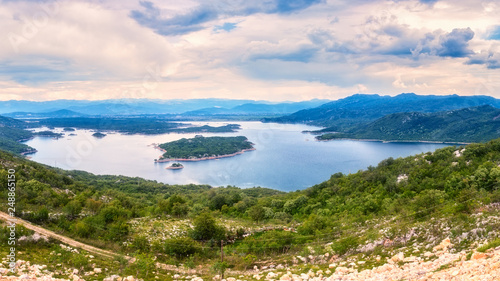 Amazing nature landscape, Slano or Solt lake (Slansko jezero) in Montenegro near Niksic, scenic panoramic aerial view, outdoor travel background © larauhryn