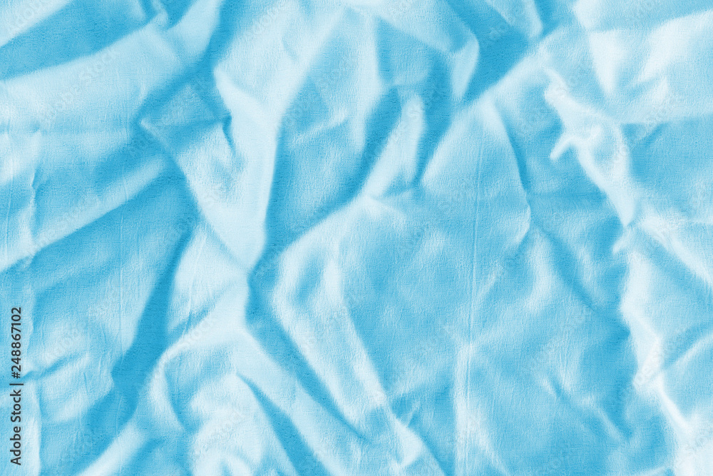 Ocean blue textile background. Silk cloth texture. Fabric pattern. Ocean blue textile background. Silk cloth texture. Fabric pattern.