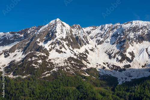 Snow-capped Mountain and blue Sky in Switzerland.
