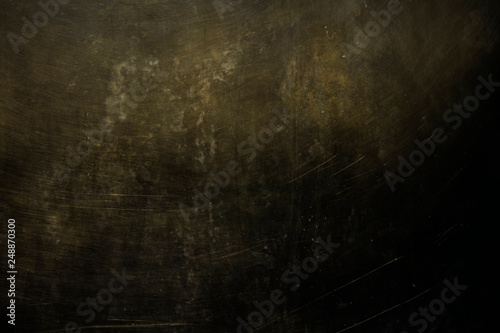 dark grungy golden wall background or texture photo