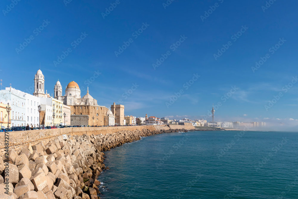 View in Cadiz seafront with mist entering from the sea.
