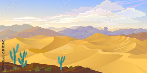 Dry desert on a dusty hot afternoon with cactus, rocks and mountains