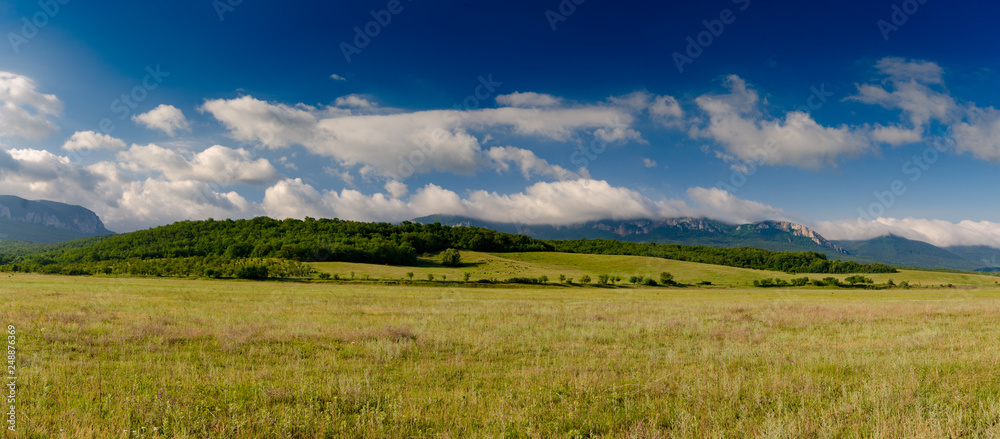 Ukrainian Crimean rural landscape under blue sky summer sunny day