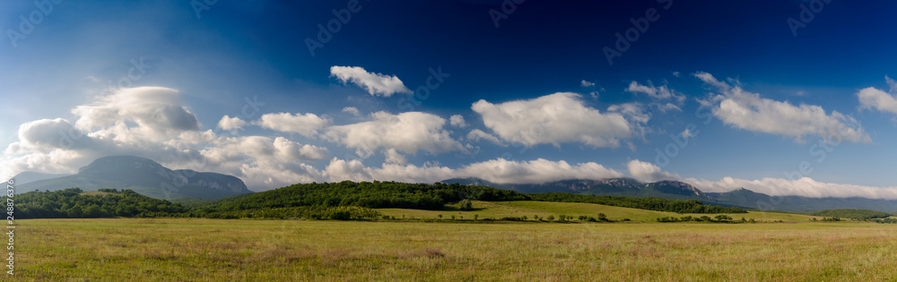 Ukrainian Crimean rural landscape under blue sky summer sunny day