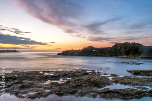 Long Exposure of the Mediterranean Sea Coast in Southern Italy at Sunset © JonShore