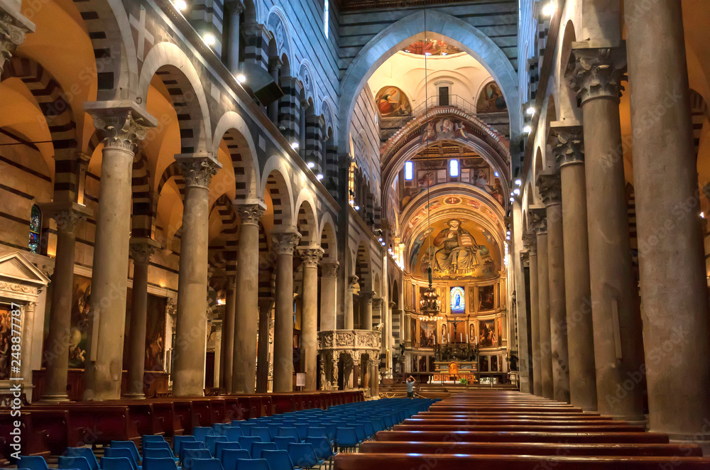 Fototapeta premium Bright interior of 11th century Roman Catholic cathedral with tall columns