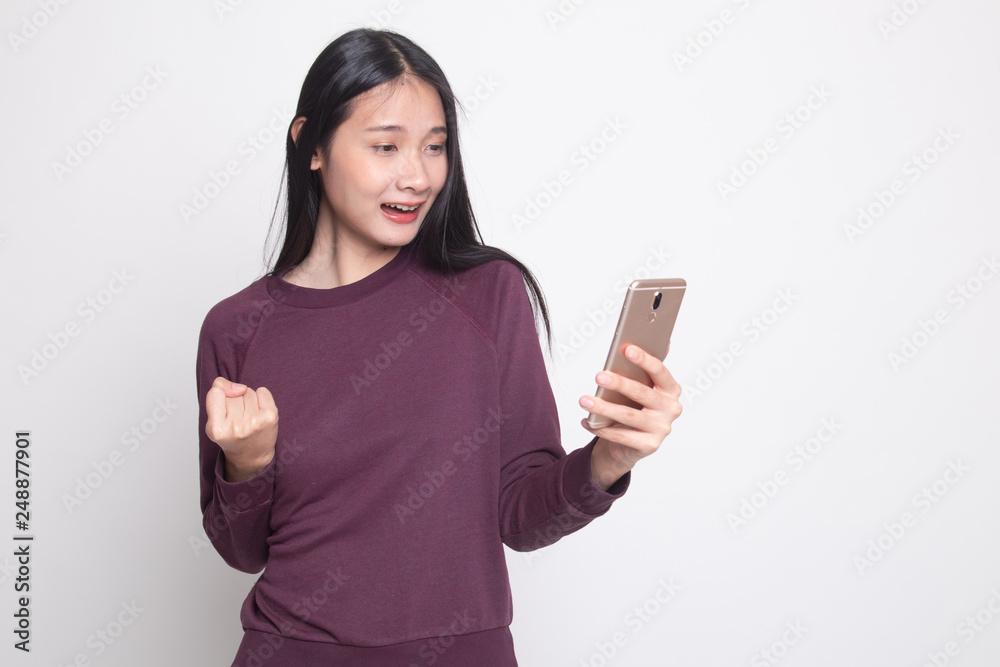 Successful young Asian woman with mobile phone. Successful young Asian woman with mobile phone.