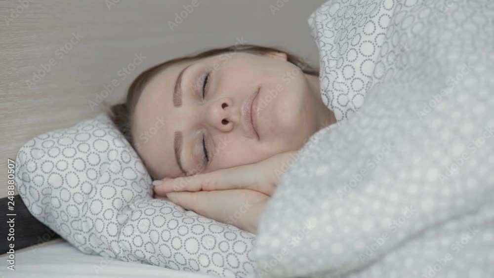 Beautiful lifestyle woman sleeping in bed at home Beautiful lifestyle woman sleeping in bed at home