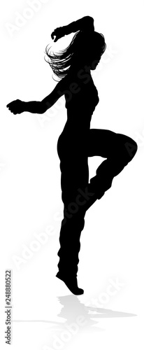 A woman street dance hip hop dancer in silhouette