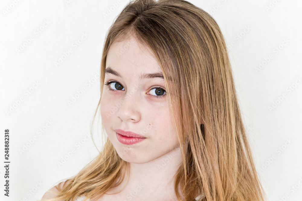 Cute girl with blond long hair on white Cute girl with blond long hair on white