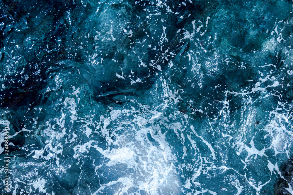 Obraz premium Blue deep sea foaming water background