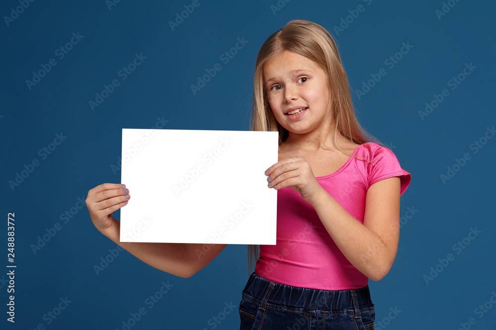 Portrait of adorable emotional little girl on blue background Portrait of adorable emotional little girl on blue background
