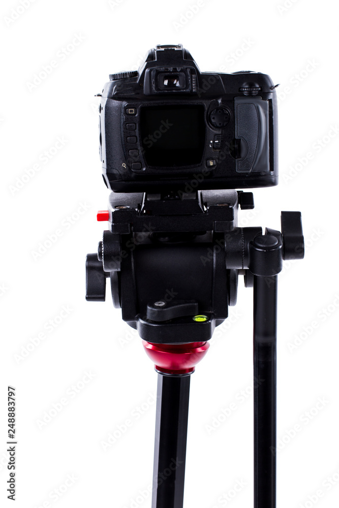 Digital photo camera on tripod. Professional photo camera isolated on white background. Studio equipment for shooting.