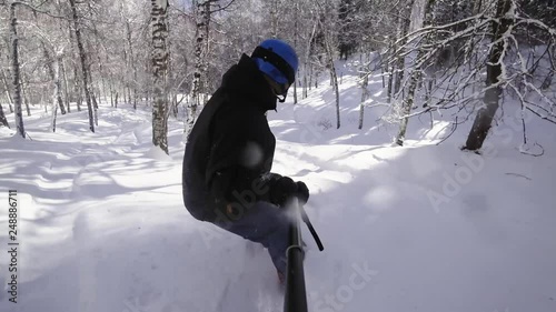 4k video person snowboarder snowboarding down slope closeup with gopro