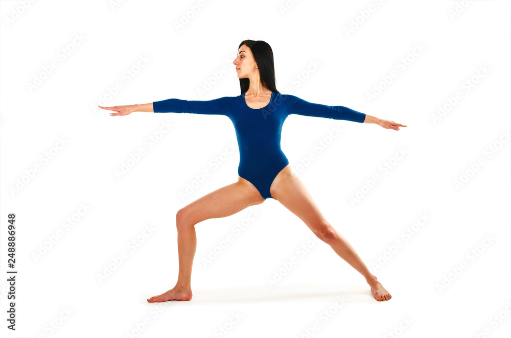 Beautiful healthy woman practices yoga in turquoise body isolated on white background.
