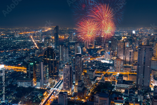 Photography Bangkok cityscape with fireworks in the business district at night