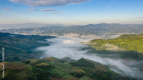 landscape mountain fog at morning time the sunrise and cloud sky background chiang rai view point Thailand