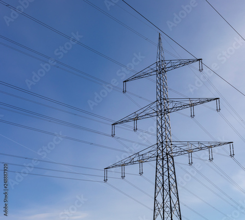 high voltage post.High-voltage tower sky background in Germany