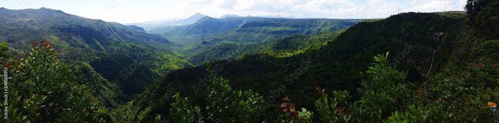 Fototapeta premium panorama of the mountains with tropical forest at mauritius