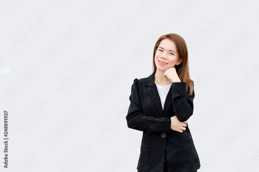 asian business woman thinking and smiling at camera with long hair in black suit isolated on white color background asian business woman thinking and smiling at camera with long hair in black suit isolated on white color background