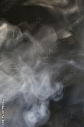 Cigarette smoke on a black background