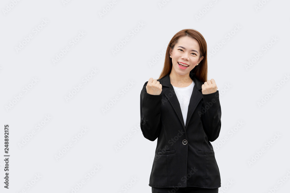 Happy asian business woman arms up in black suit isolated on white color background Happy asian business woman arms up in black suit isolated on white color background