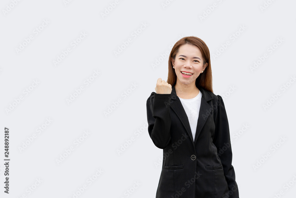 Happy asian business woman arms up in black suit isolated on white color background Happy asian business woman arms up in black suit isolated on white color background