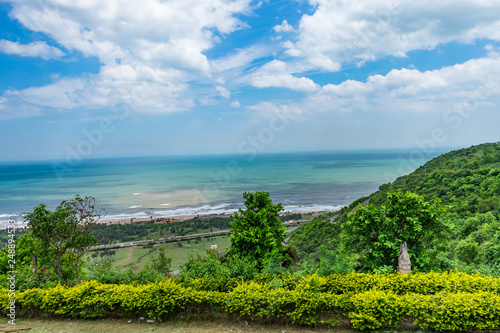 Awesome view of sea beach & blue sky scenery from a top of a mountain road.