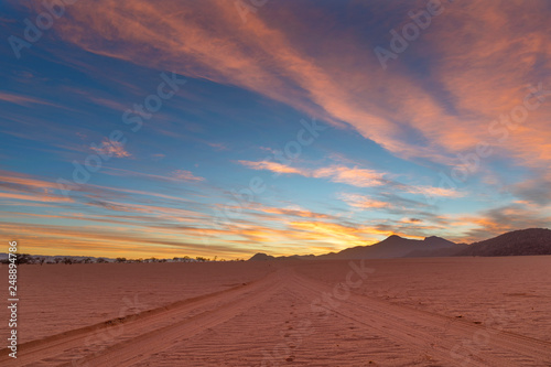 Yellow and pink colored clouds at sunrise