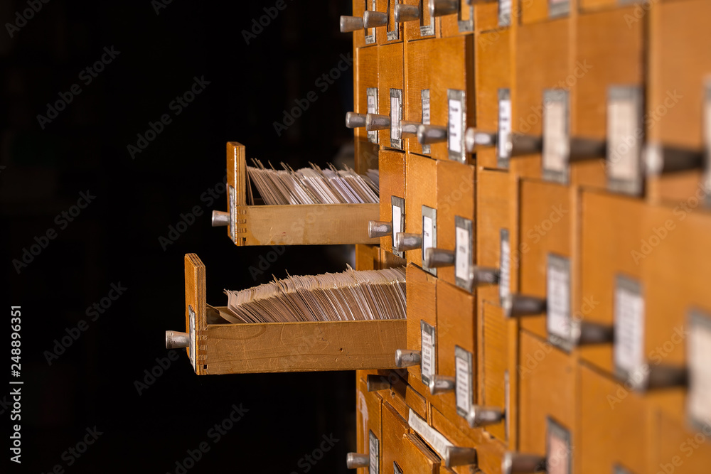 Old library reference catalogue with opened card drawer Stock Photo