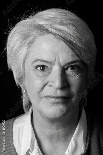 Portrait of a mature woman doing facial expressions