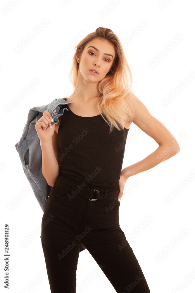 Stylish young woman in black stand isolated over white background and smile Stylish young woman in black stand isolated over white background and smile